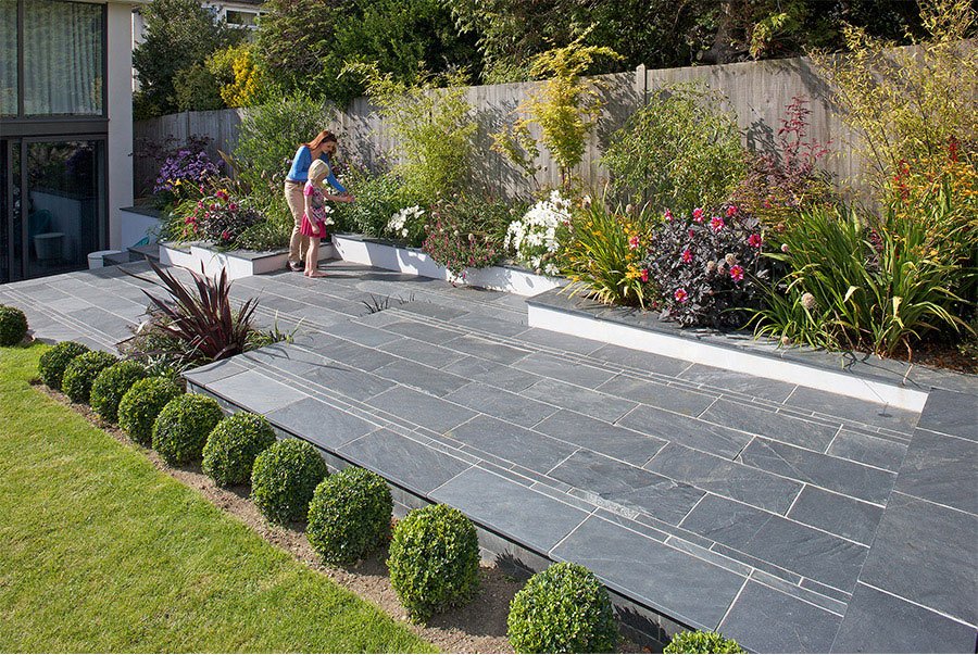 Garden terrace paved with blue-grey slate